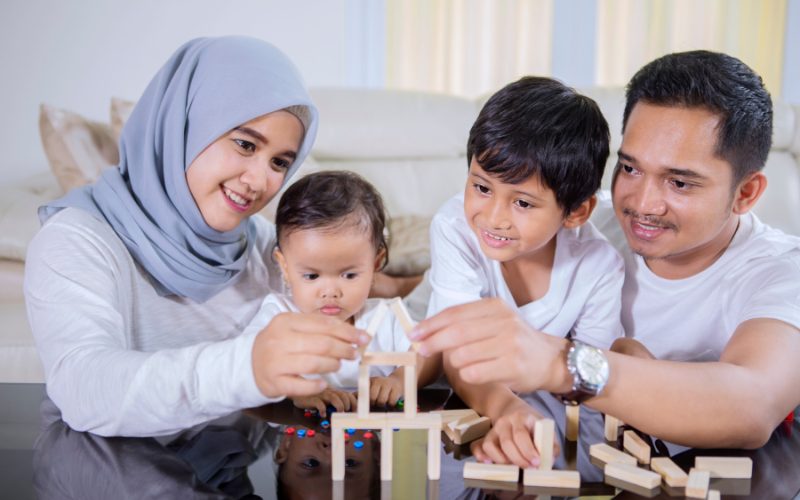 A young Muslim couple discussing Halal financing options